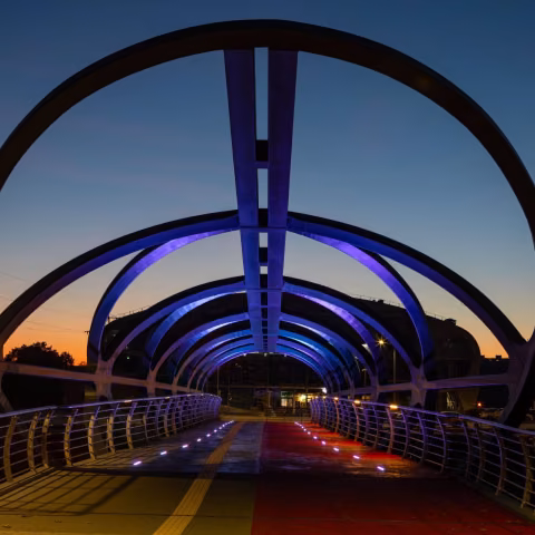 Smart and colourful pedestrian bridge attracts attention with its futuristic form