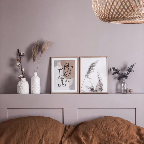 lilac colour wall and matching bed headboard